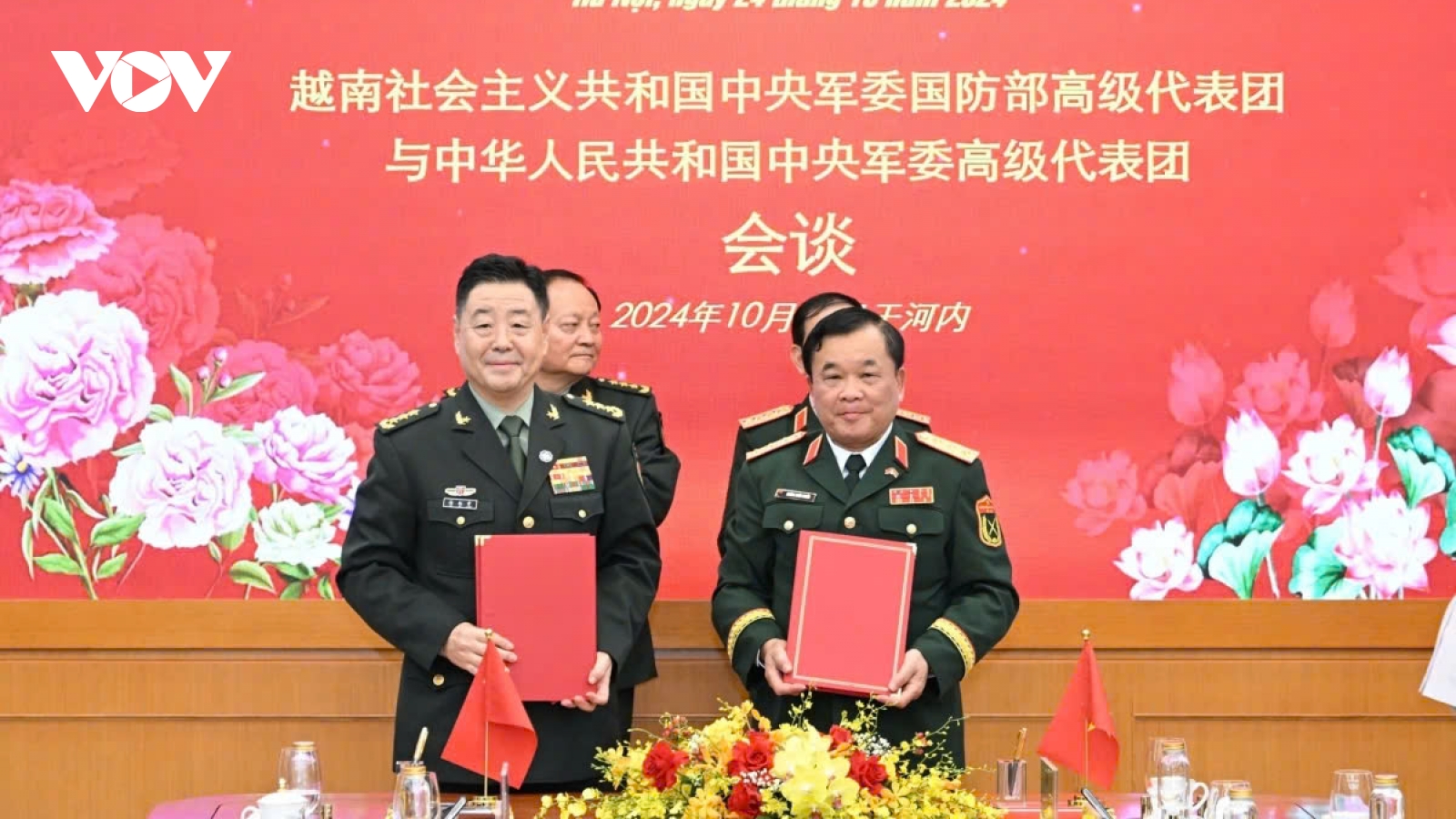 Vietnam and China sign defense cooperation document